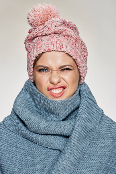 Funny woman wearing winter clothes. - Foto, imagen