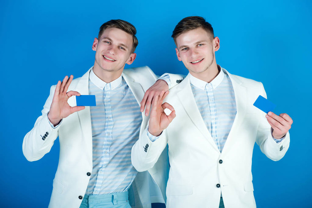 Men holding blank cards with ok gestures - Foto, afbeelding