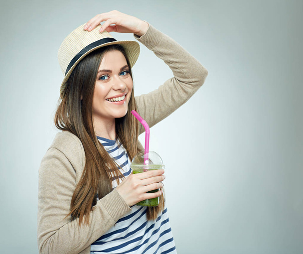 Smiling woman holding juice glass - Foto, Imagen