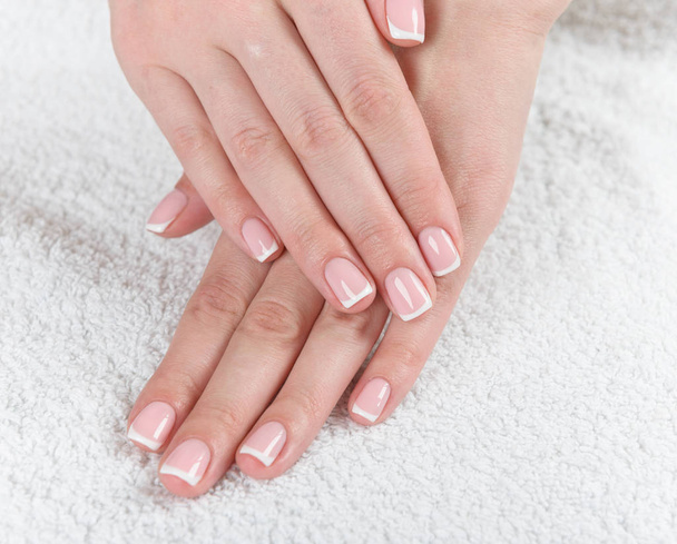 female hands with french manicure  - Foto, Bild