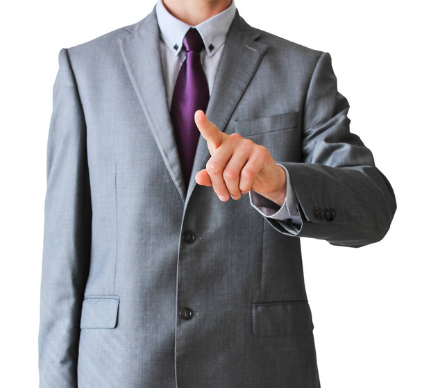 Ділова людина натискає пальцем, ізольовано на білому тлі
 - Фото, зображення