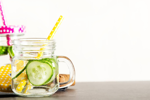Refreshing cucumber cocktail, lemonade, detox water in a glasses - Fotó, kép