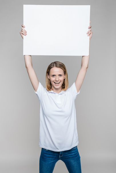 woman with blank board - Foto, Imagem