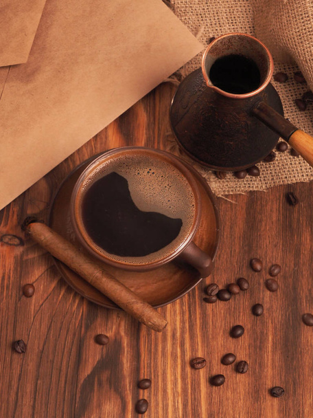 Coffee cup on a wooden backgound. - Fotó, kép