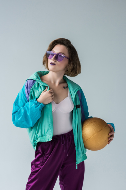 stylish woman holding ball - Foto, Imagen
