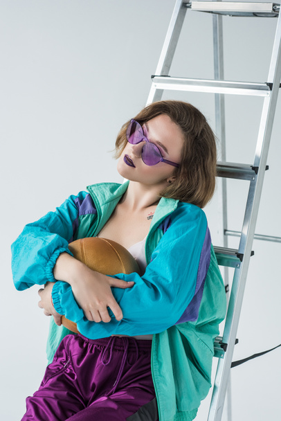 stylish woman leaning on ladder - Photo, Image