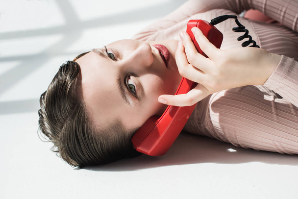 stylish girl with vintage telephone  - Fotografie, Obrázek