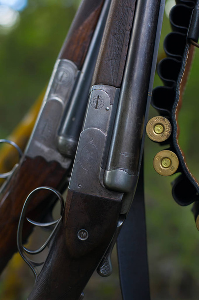 OLd hunting gun and cartridge. - Fotó, kép