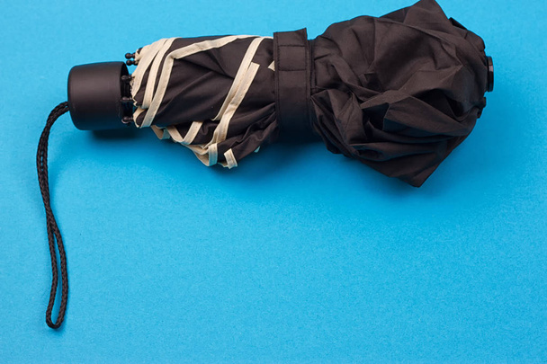 Parapluie fermé noir
 - Photo, image