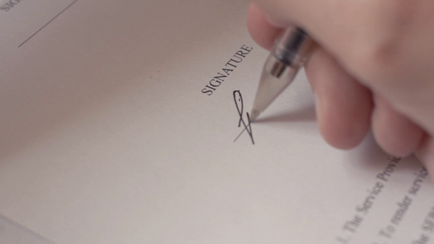 Male hand turning page signing contract in black ink. Close up. Fake signature - Footage, Video