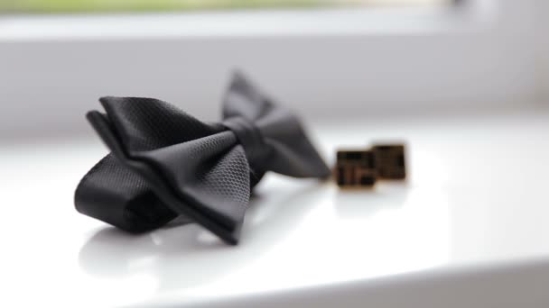 Wedding cufflinks and bow tie close up - Footage, Video