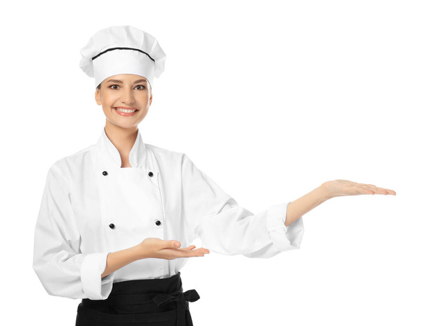 Young female chef on white background - Φωτογραφία, εικόνα