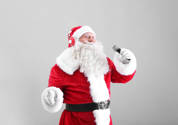Santa Claus singing Christmas songs - Photo, image