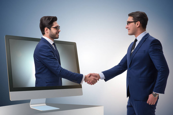 Két üzletember kézfogás telepresence koncepció - Fotó, kép