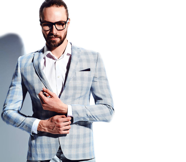 portrait of handsome fashion stylish hipster businessman model dressed in elegant light blue suit  isolated on white - Fotografie, Obrázek