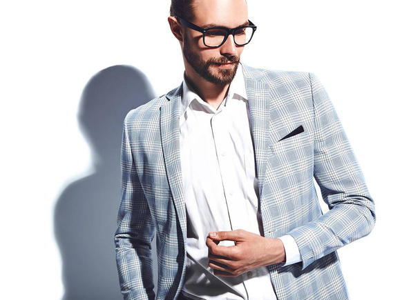 portrait of handsome fashion stylish hipster businessman model dressed in elegant light blue suit  isolated on white - Foto, Imagem