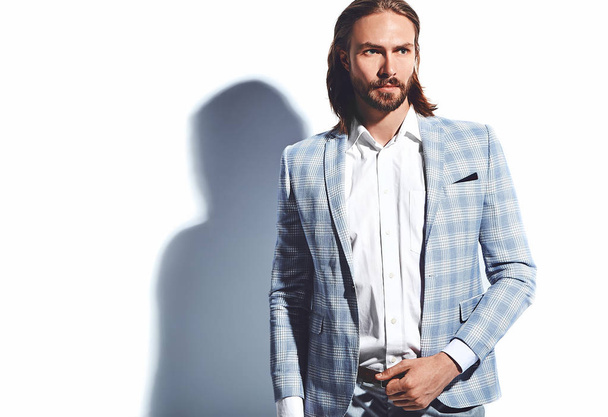 portrait of handsome fashion stylish hipster businessman model dressed in elegant light blue suit  isolated on white - 写真・画像