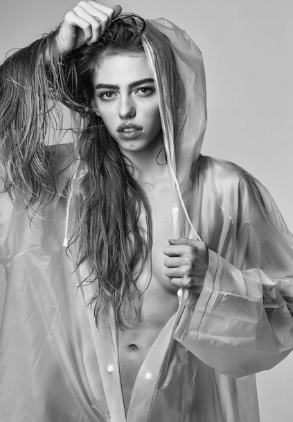 beauty or girl in sexy raincoat - Valokuva, kuva