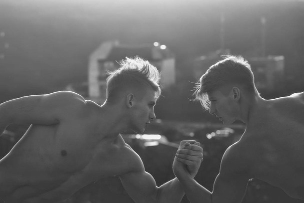 men or bodybuilders wrestling - Foto, immagini