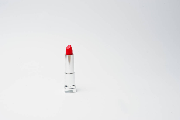 Close-up photo of an isolated red lipstick. - Fotoğraf, Görsel