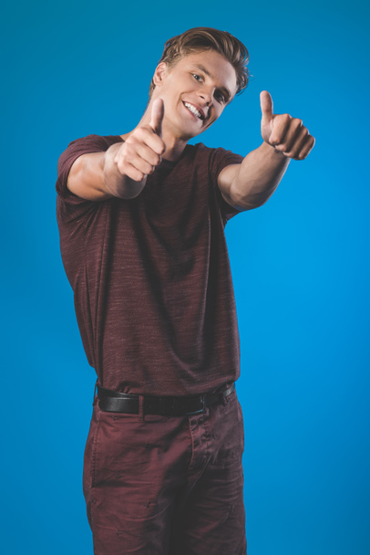 man showing thumbs up - Foto, afbeelding