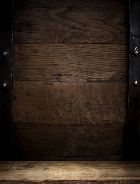 background of barrel and worn old table of wood - Zdjęcie, obraz