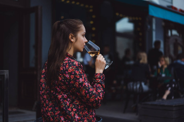 girl drinking glass of wine  - Фото, зображення