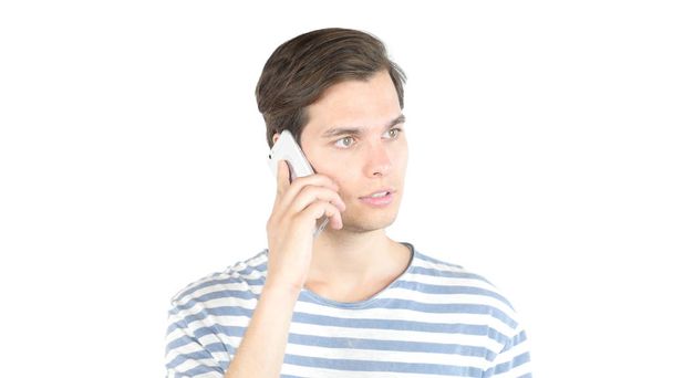 Junger Mann telefoniert mit Smartphone - Foto, Bild