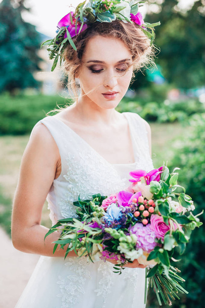 Beautiful bride in a  wedding dress - Фото, зображення