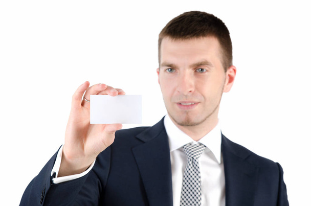 Man holding white business card on white background - Фото, зображення