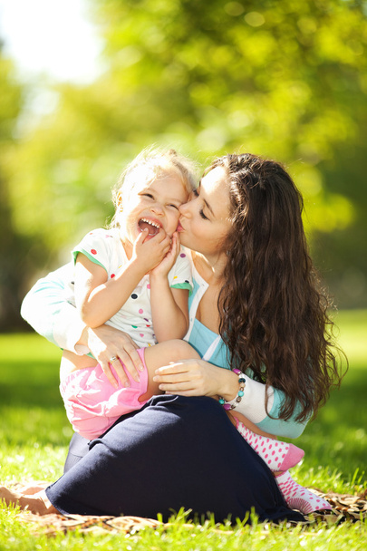 Mother and daughter in the park - Photo, image