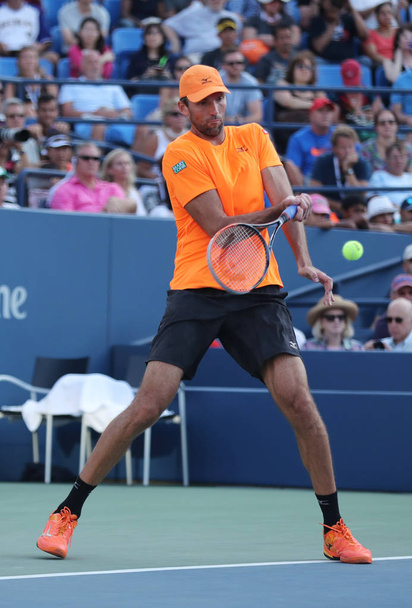 Professional tennis player Ivo Karlovic of Croatia in action during US Open 2016 round four match  - Foto, Imagen