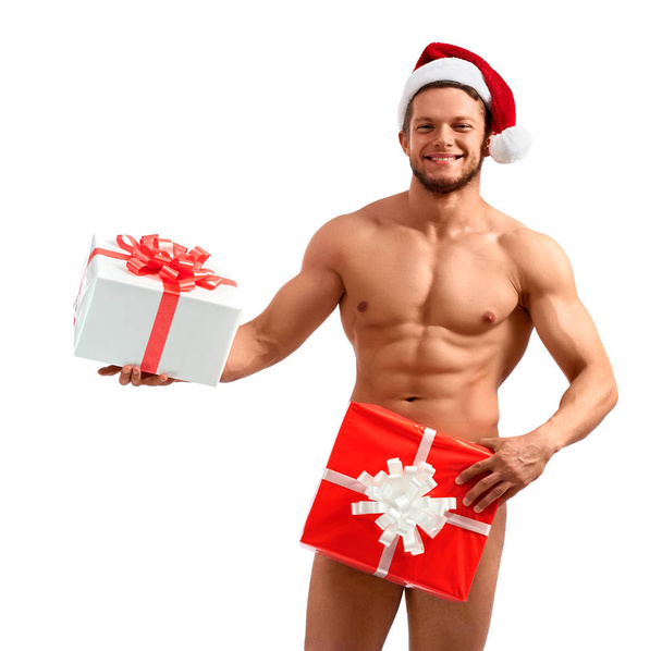 Naked Santa posing with presents - Zdjęcie, obraz