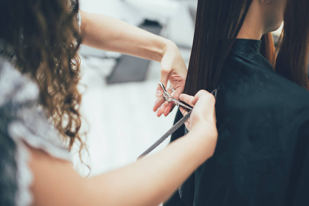Stylist working in the beauty salon, haircut and hair styling - Photo, Image