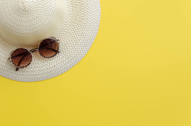 Hat and sunglasses - Фото, изображение