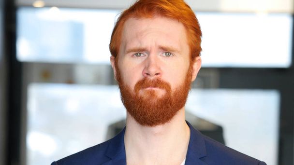 Sad Businessman with Red Hair, Beard - Foto, afbeelding
