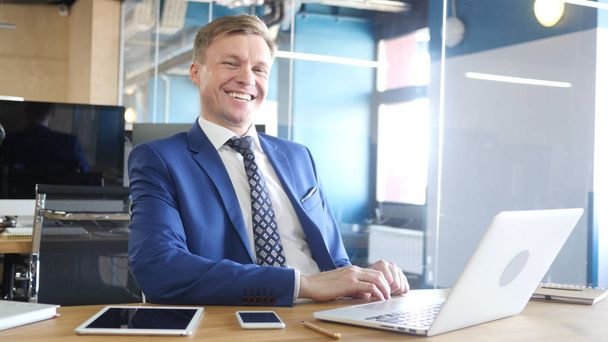 Laughing Businessman In Office - Photo, Image