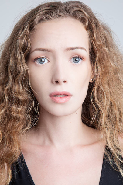 Snapshot of young model with curly hair - Photo, Image
