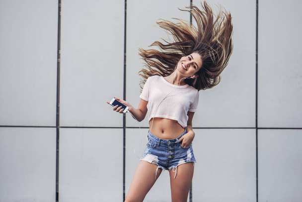 Beautiful teenager having fun - Photo, Image