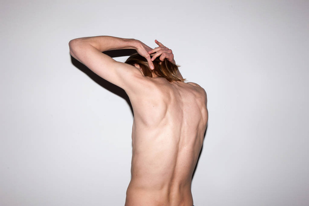 Seductive naked male. Flirty mood - Фото, изображение