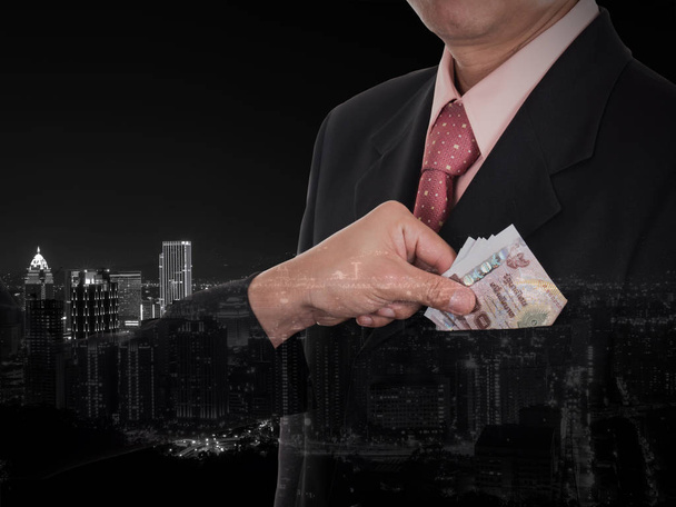 Double exposure of businessman giving a bribe for corruption som - Photo, Image