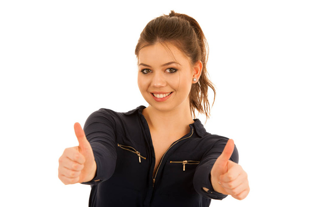 beautiful young woman showing thumb up as a gesture for success  - Foto, Imagen