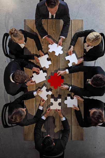 Business people and puzzle - Photo, Image