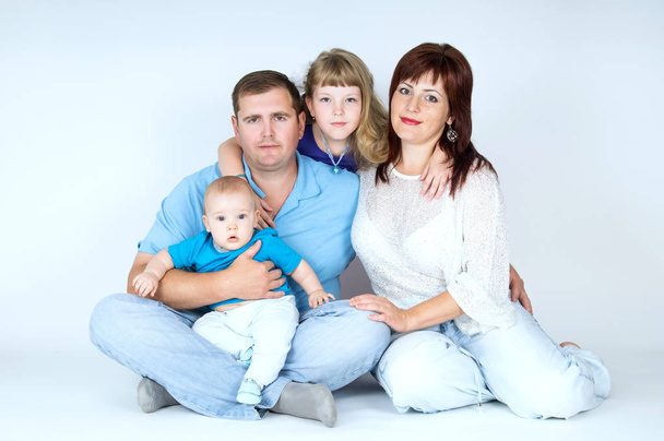 Happy young family with young children - Foto, Bild