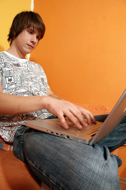 Boy using laptop - Foto, Imagen