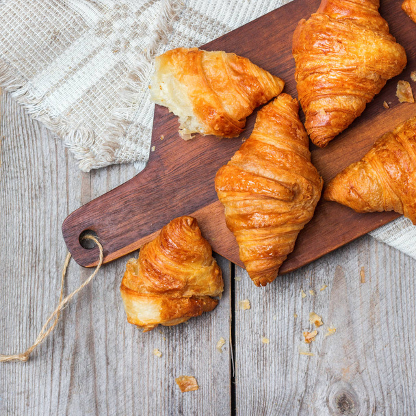 Fresh croissants on a table for breakfast - Photo, Image