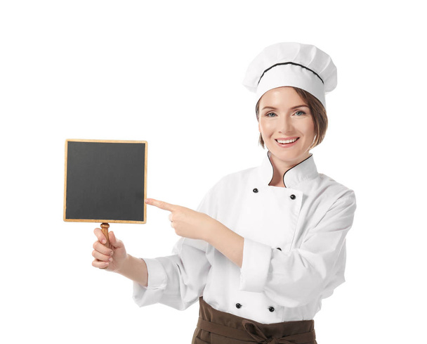 Female chef with blank board on white background - Photo, Image