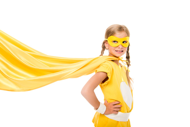 supersankari tyttö heiluttaa viitta
 - Valokuva, kuva