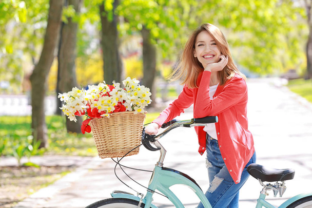Young girl with bicycle - Photo, Image