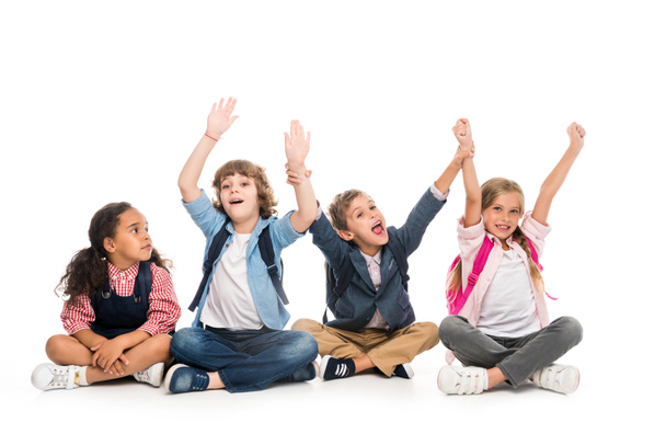 excited multiethnic schoolchildren - Foto, Imagem